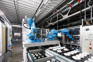 >ASS< End of Arm Tooling robotic arms working in automation setting